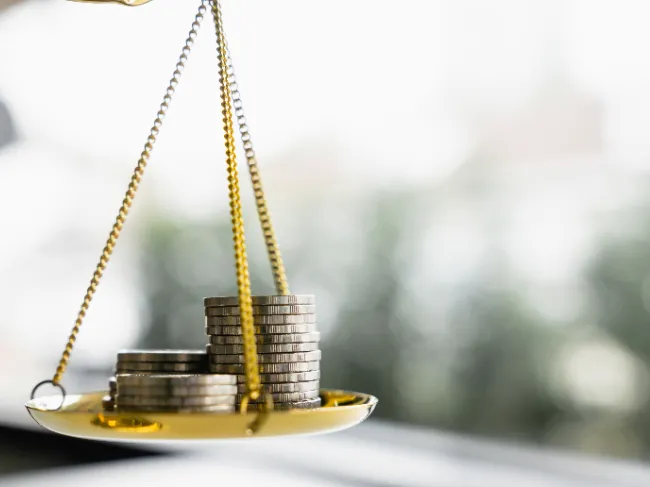 scale with coins
